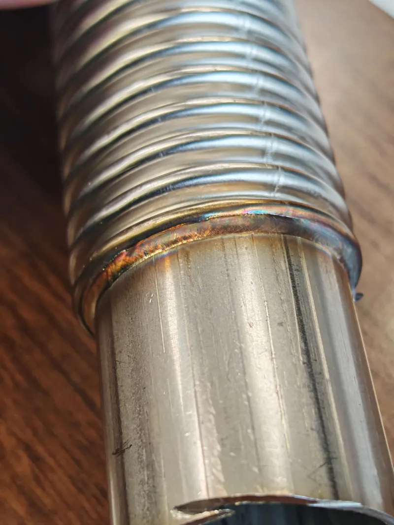 Welding of a 0.4 mm thick stainless steel bellows onto a stainless steel pipe